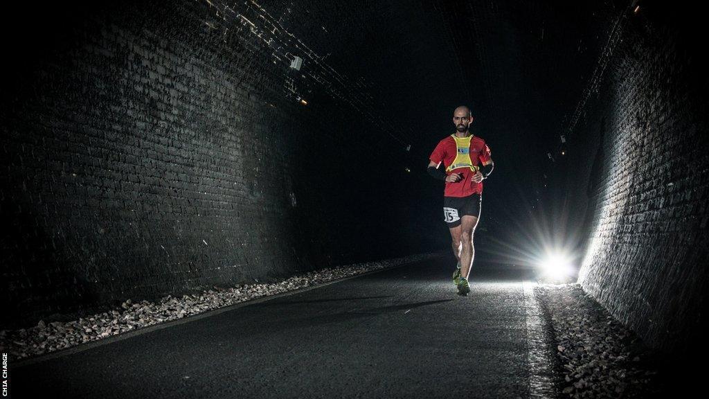 Runner in the Combe Down tunnel during the Tunnel Ultra