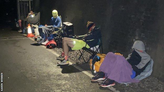 Crew waiting at the Tunnel Ultra entrance through the night