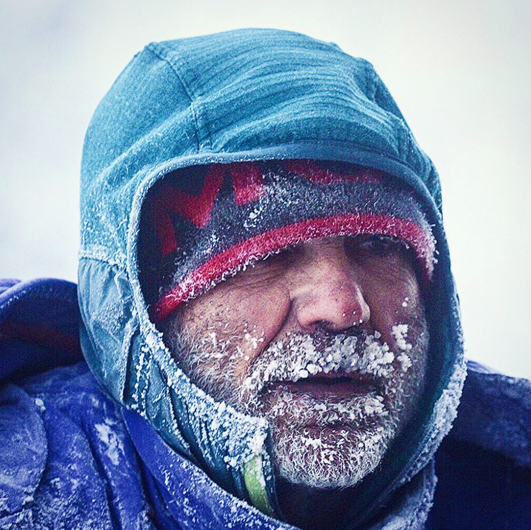 Competitor's face encrusted in frost and ice